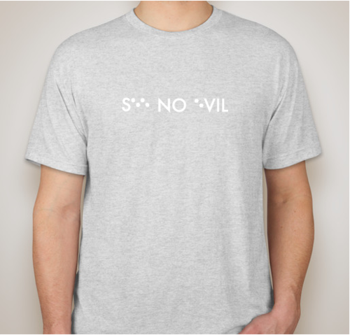 Grey shirt with "See No Evil" spelled with braille and letters.