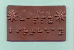 Chocolate bar with braille writing.
