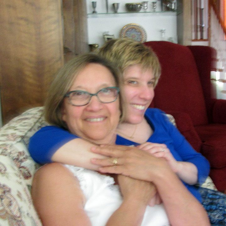 Lauren Rosenberg and her mom on a sofa