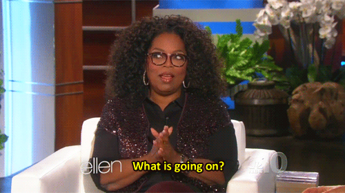GIF of Oprah looking suspicious, saying "What is going on?"