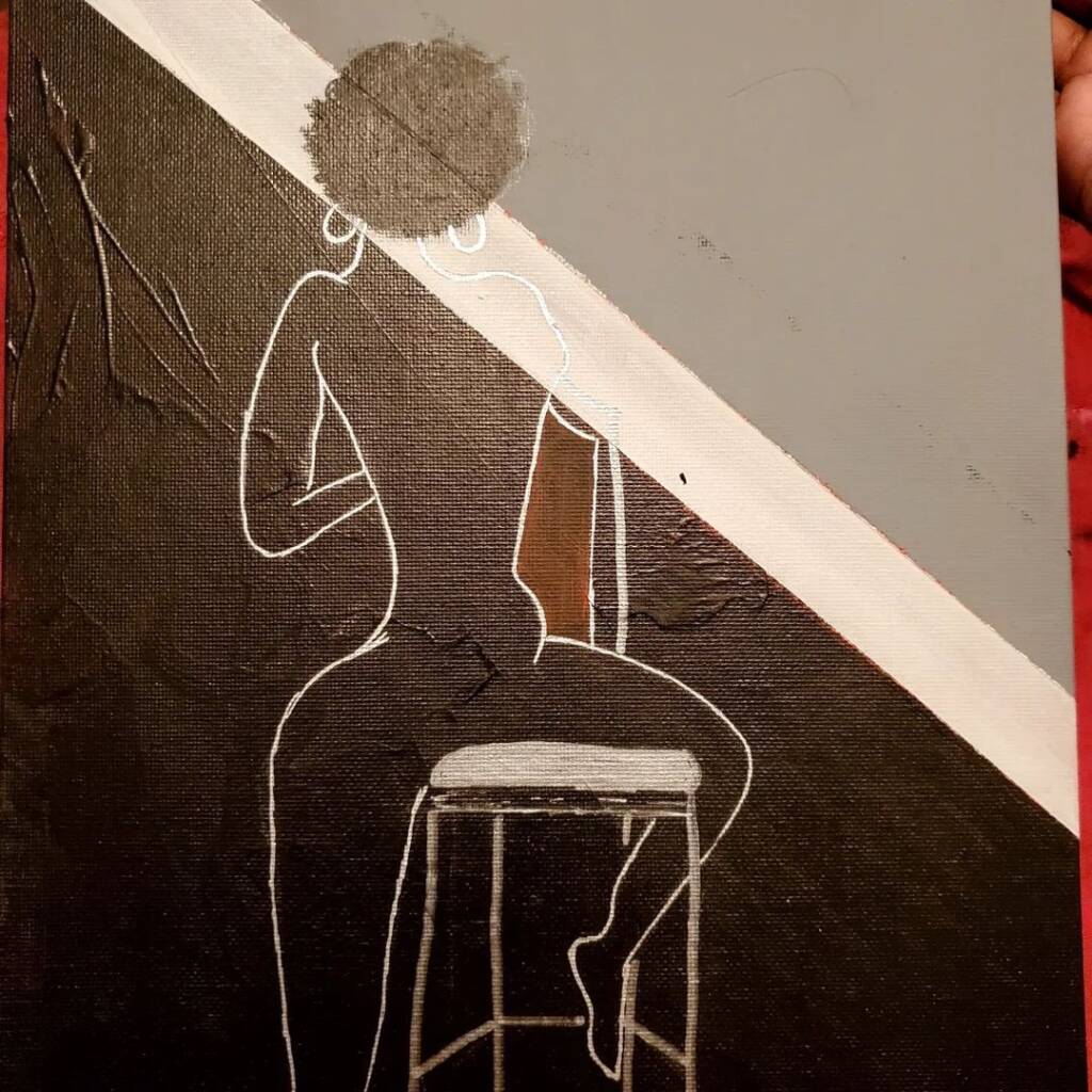 A painting in tones of black, white, gray and brown. A view of a woman from behind. She's sitting on a backwards-facing chair. Her hair is in a natural, curly style and she's wearing large hoop earrings.